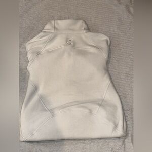 White lululemon scuba fleece with good zipper. Never worn before new with tags.